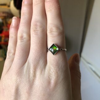 Adjustable sterling silver ammolite ring